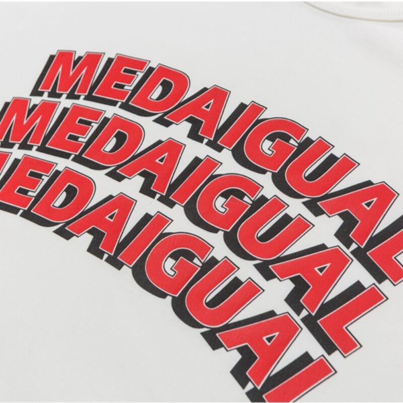 【MEDAIGUAL】ロゴプリントTシャツ B413